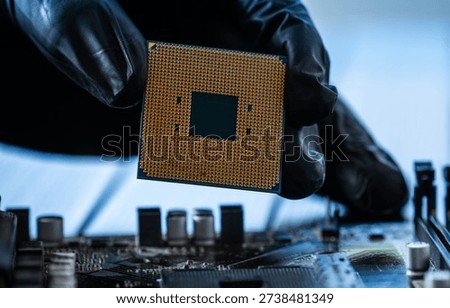 Computer Repairman Holds A Pc Processor Before Replacement