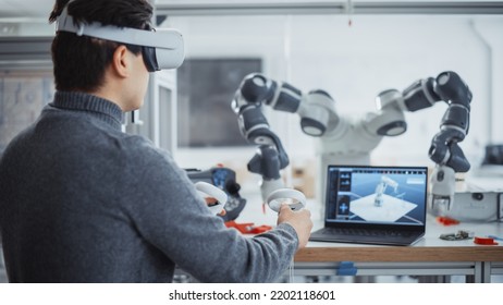Computer Science Specialist in Virtual Reality Headset Holding Controllers and Moving Bionic Claw. Man Developing Program for Motion of Robotic Arm. Innovative Automated Technologies Concept.