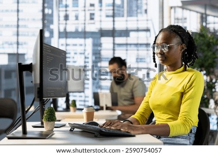 Computer scientist fixing applications issues, dealing with databases and server configuration. African american woman optimizing company software for improved performance and scalability