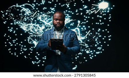 Computer scientist optimizes neural network neurons map with tablet and AR simulation tech, african american man fine tuning machine learning AI model synaptic weights with device, camera A.