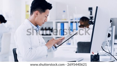 Computer, scientist and reading with tablet in lab, research biotech innovation and medical development. Medicine report, trial results and man check pharma test, tech and healthcare breakthrough.