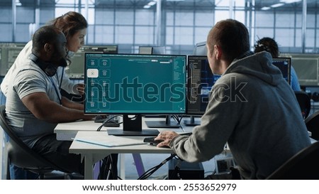Computer scientist in server room making software producing AI generated videos. IT specialist building artificial intelligence diffusion model app turning text prompts into clips, camera A