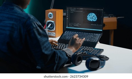 Computer scientist updating artificial intelligence neural networks, writing binary code scripts. Remote worker in apartment office uses digital device programming to upgrade AI, camera A