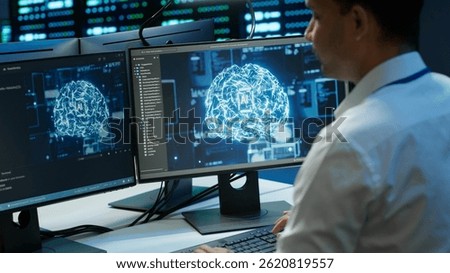 Computer scientist using AI tech on PC to do checkup in server room. IT staff member in data center using artificial intelligence technology to process datasets for training, camera A
