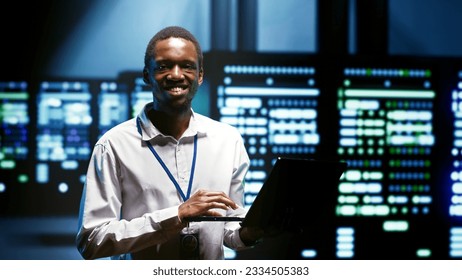 Computer scientist using tablet to analyze server cabinets providing computing resources and storage, enabling artificial intelligence to process massive datasets for training and machine learning