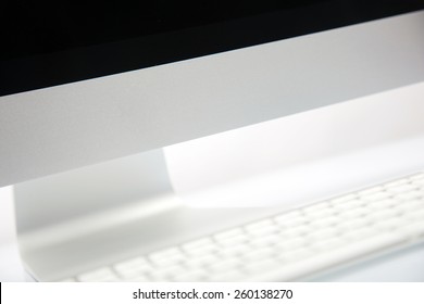 Computer Screen and Keyboard on White Background