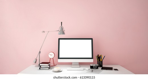 Computer Screen On Table , Working Area , Pink Wall Background,copy Space,workspace