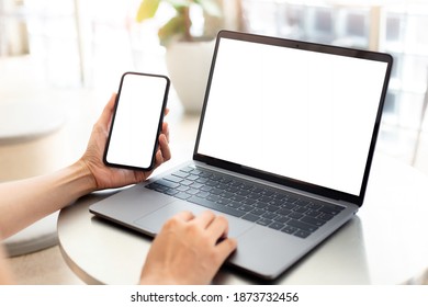 Computer Screen,cell Phone Blank Mockup.hand Woman Work Using Laptop Texting Mobile. With White Background For Advertising,contact Business Search Information On Desk In Cafe.marketing,design