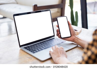 computer screen,cell phone blank mockup.hand woman work using laptop texting mobile.white background for advertising,contact business search information on desk in cafe.marketing,design