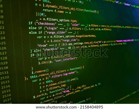 Computer script coding source code on desktop monitor. Programming, webdesign HTML printed code