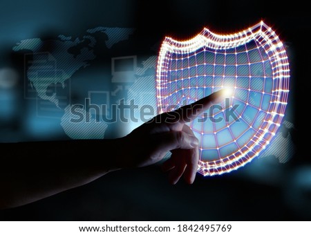 Computer security concept. Hand and padlocks symbolizing data protection in the network and personal computers. Mixed media.