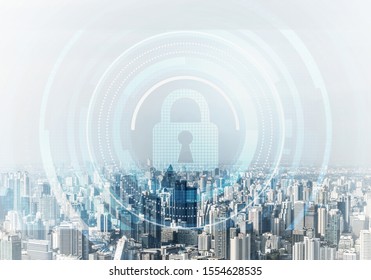 Computer security concept and information technology. Risk management and professional safeguarding. Virtual padlock hologram on background of city skyline. Innovative security solution for business.