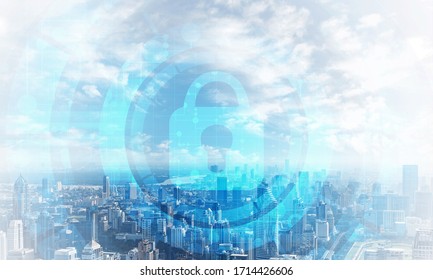 Computer security concept and information technology. Risk management and professional safeguarding. Virtual padlock hologram on background of city skyline. Innovative security solution for business.
