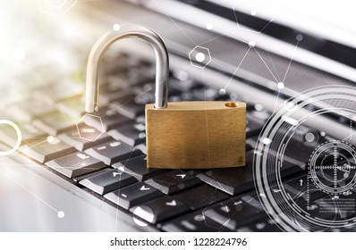 Computer security concept with a padlock on a keyboard, light effect