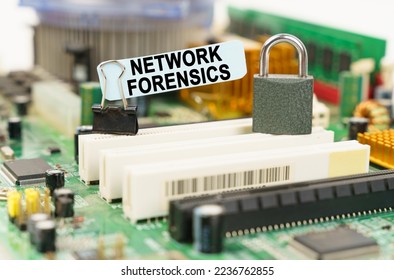 Computer security concept. There is a sticker on the motherboard that says - Network Forensics