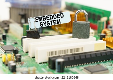 Computer security concept. There is a sticker on the motherboard that says - Embedded system
