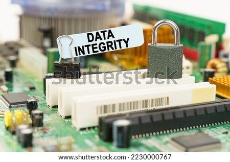 Computer security concept. There is a sticker on the motherboard that says - Data integrity