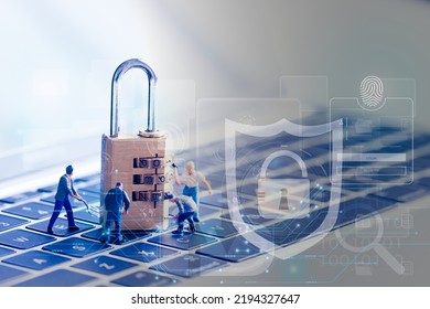 Computer security concept. Unlocked padlock and keys on notebook keyboard. Symbol of safe.Hackers attack internet security.key and shield icon Refers to the organization's information security system.