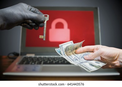 Computer security and extortion concept. Ransomware virus has encrypted data in laptop. Hacker is offering key to unlock encrypted data for money. - Shutterstock ID 641443576