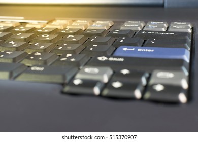 Computer Server mainframe and object keyboard zoom at button in datacenter , process in soft orange sun light style