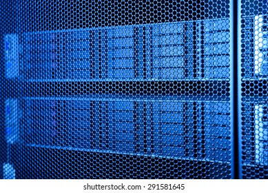 computer server in rack with blue light close up