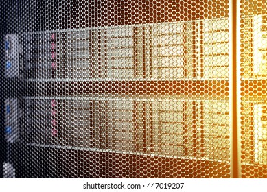 computer server in rack with blue light close up