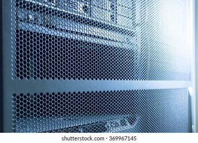 Computer Server In Rack Server Close-up With Blue Light