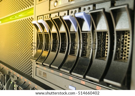 Computer Server and raid storage in datacenter , process in soft orange sun light style