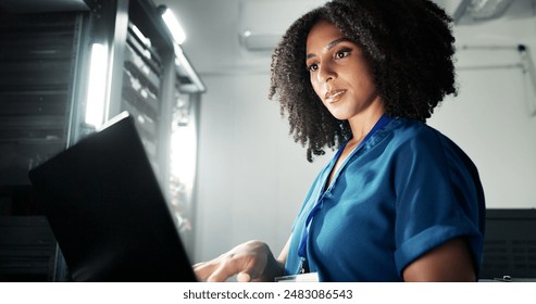 Computer, server room and woman programming software, update or system network maintenance. Technology, data center or technician on laptop for information, cyber security or code for cloud computing