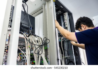 Computer Server with Technician - Powered by Shutterstock - Get 15% off with code: PIKWIZARD15