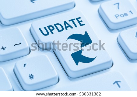 Computer software update network security virus symbol blue keyboard