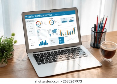 Computer software for website traffic analytics data on computer screen. Concept of SEO search engine optimization and customer targeting for online business snugly