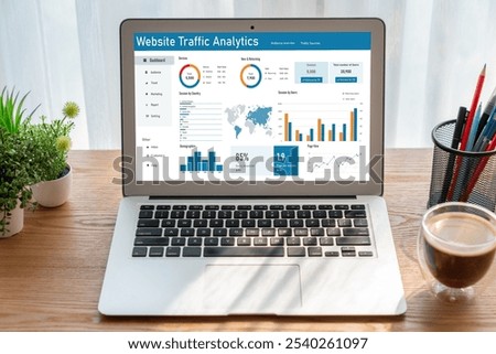 Computer software for website traffic analytics data on computer screen. Concept of SEO search engine optimization and customer targeting for online business snugly
