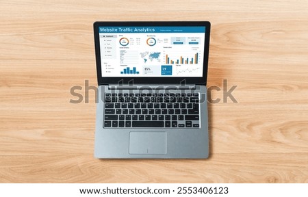 Computer software for website traffic analytics data on computer screen. Concept of SEO search engine optimization and customer targeting for online business snugly