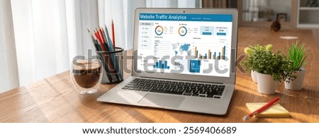 Computer software for website traffic analytics data on computer screen. Concept of SEO search engine optimization and customer targeting for online business snugly