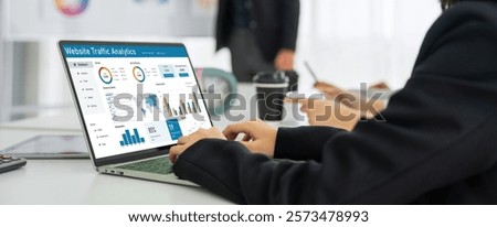 Computer software for website traffic analytics data on computer screen. Concept of SEO search engine optimization and customer targeting for online business snugly