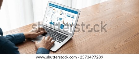 Computer software for website traffic analytics data on computer screen. Concept of SEO search engine optimization and customer targeting for online business snugly