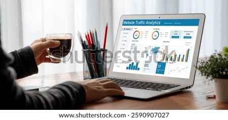 Computer software for website traffic analytics data on computer screen. Concept of SEO search engine optimization and customer targeting for online business snugly
