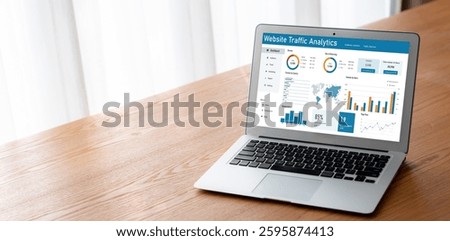 Computer software for website traffic analytics data on computer screen. Concept of SEO search engine optimization and customer targeting for online business snugly