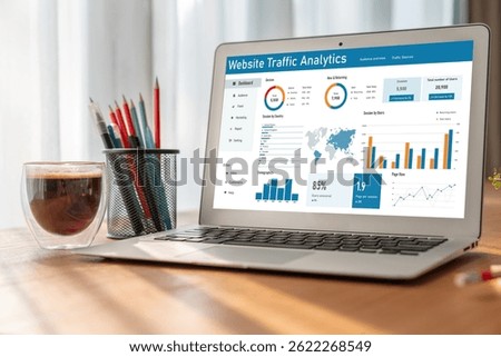 Computer software for website traffic analytics data on computer screen. Concept of SEO search engine optimization and customer targeting for online business snugly