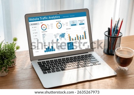 Computer software for website traffic analytics data on computer screen. Concept of SEO search engine optimization and customer targeting for online business snugly