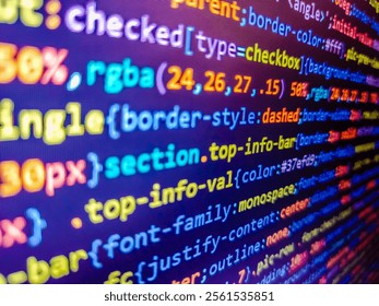 Computer source code in blue. Stock market graph on screen. Search for encryptions in binary data. Encrypted data. Finance and economic graphs. Software development by programmer. Blue php.