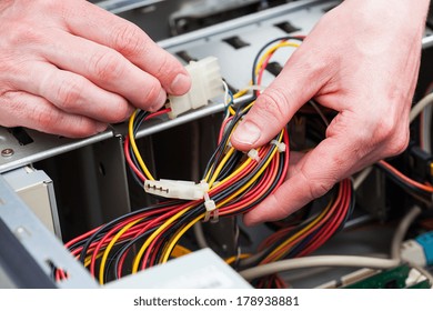 Computer Specialist Hold Cables