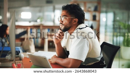 Computer, student and man in library for reading, learning and research project with ideas. University, thinking or male person with technology on campus for education, college literature or studying