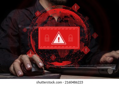 Computer system hack warning. The concept of a cyber attack on a computer network. Malicious software, viruses and cybercrime. Hacking personal data	