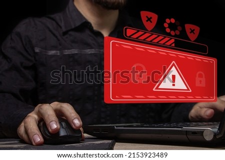 Computer system hack warning. The concept of a cyber attack on a computer network. Malicious software, viruses and cybercrime. Hacking personal data