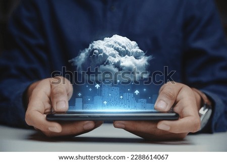 Computer system resources and data storage, Cloud service technologies concept, Businessman holding smartphone with connect to cloud data.