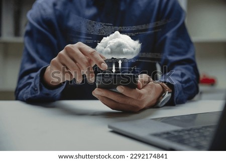 Computer system resources and data storage, Cloud service technologies concept, Businessman holding smart phone with cloud computing icon.