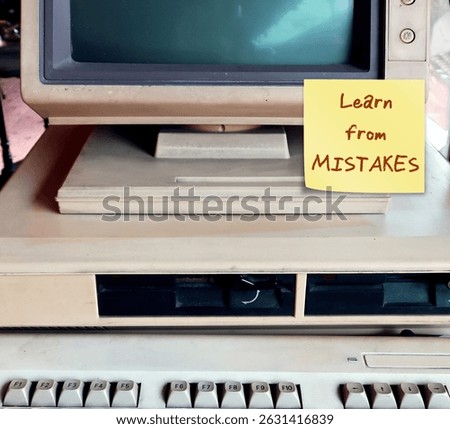 Computer with text written note LEARN FROM MISTAKES - acknowledging errors, causes of mistakes - developing strategies to avoid repeating them- learning process to personal growth and self improvement