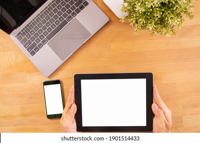 Computer top view for your add your text or advertisement on blank monitor.Overhead with electronic equipment.